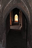 Bagan Myanmar. The long, narrow corridors with high ceiling inside Dhammayangyi temple. 